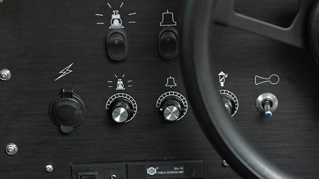 Wattman signature Sound in Motion system with synchronized steam sound effects for immersive family rides